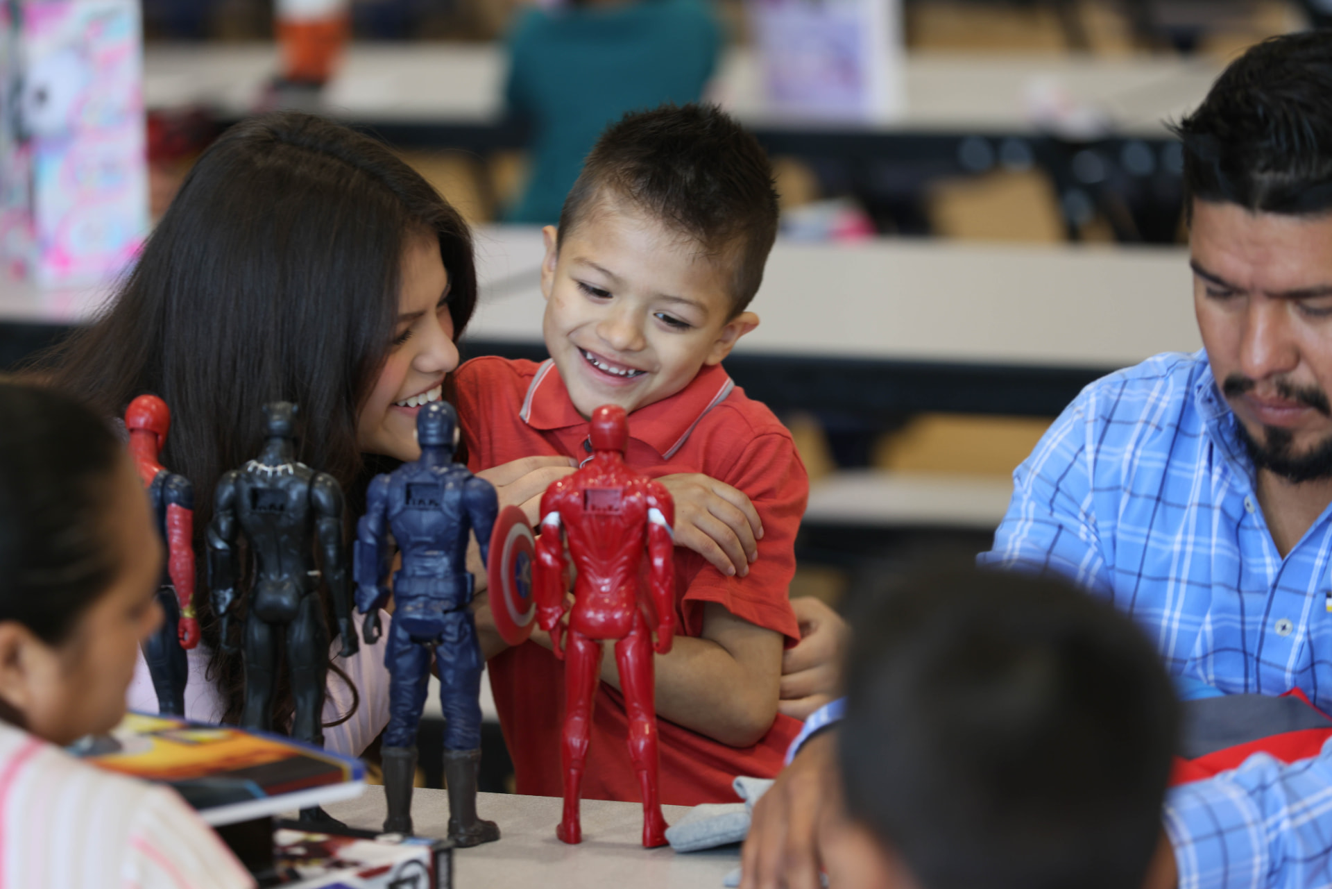Family sharing a joyful moment at a ROOTED event