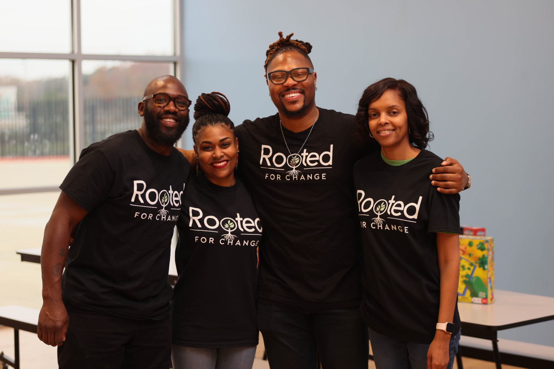 ROOTED for Change community members at a local event
